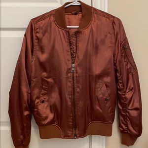 Rust coloured bomber jacket